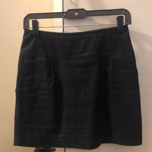 Cute textured black mini skirt.